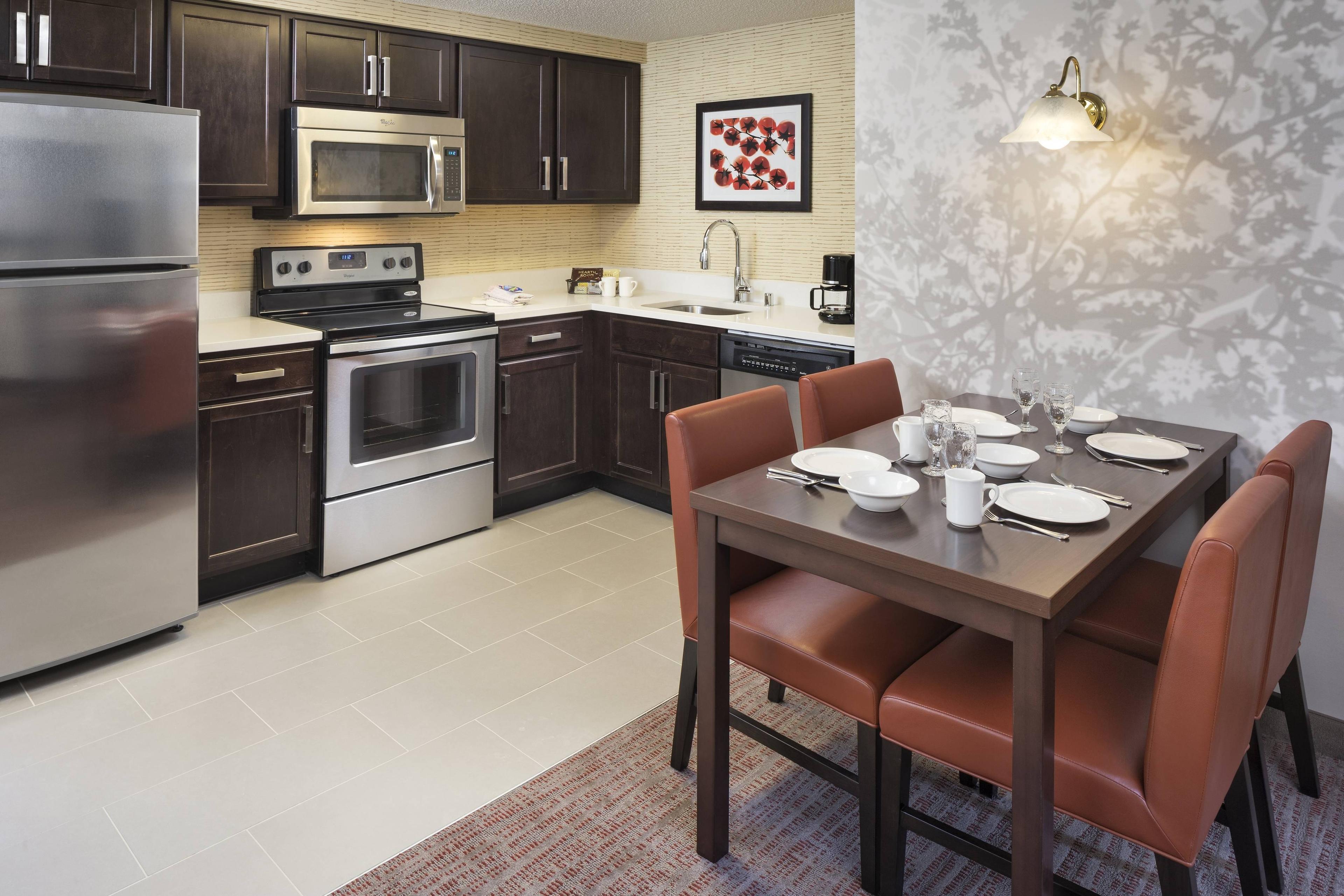 Our Two-Bedroom Suite with fireplace offers a larger kitchen and living area for a family to relax and unwind.