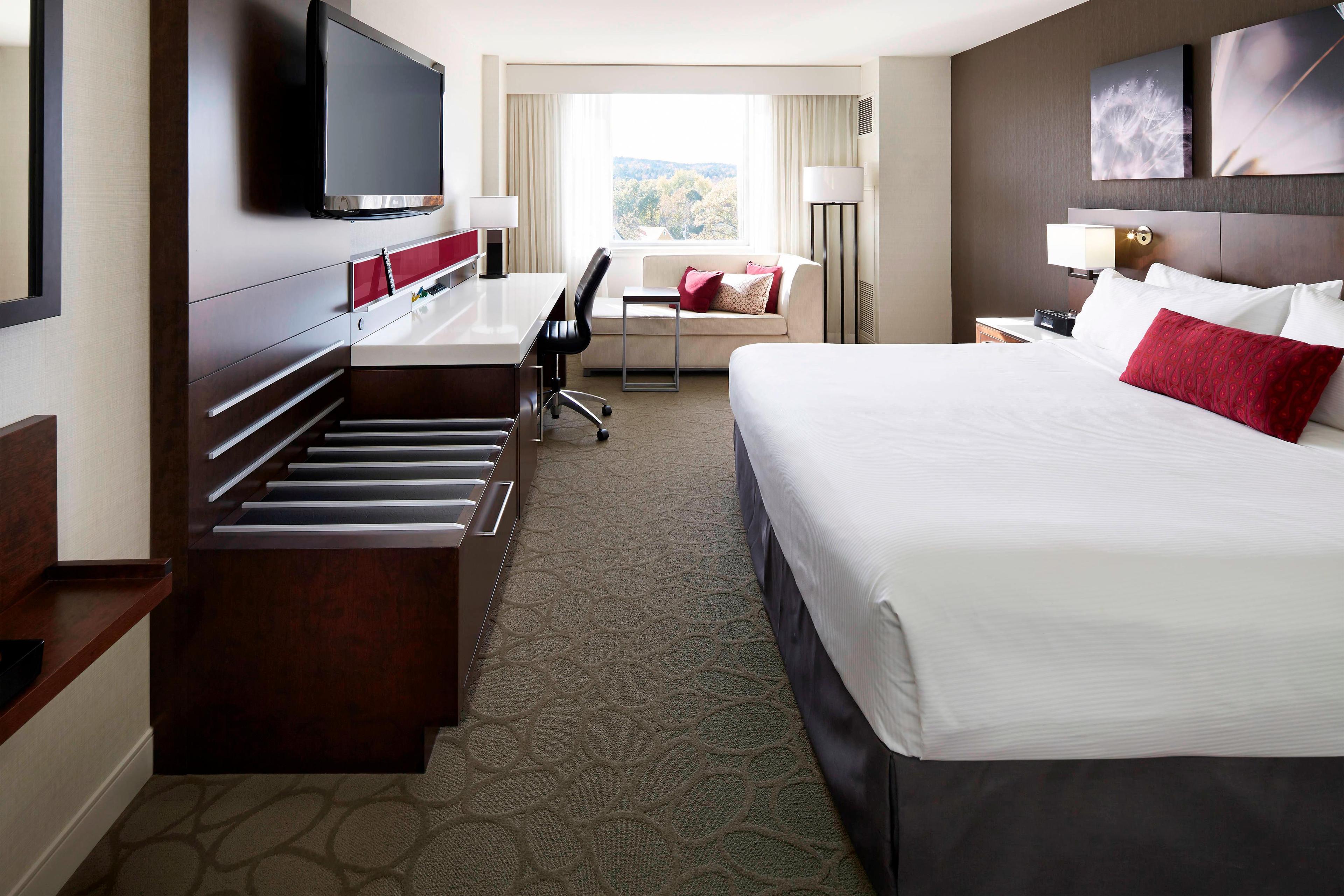 Relax on your comfortable bed while watching premium channels on the flat screen TV in your contemporary guest room.