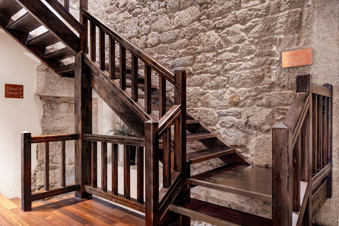 Stairs made of wood contrast with stone walls, scenaries that makes you wonder in which century we are.