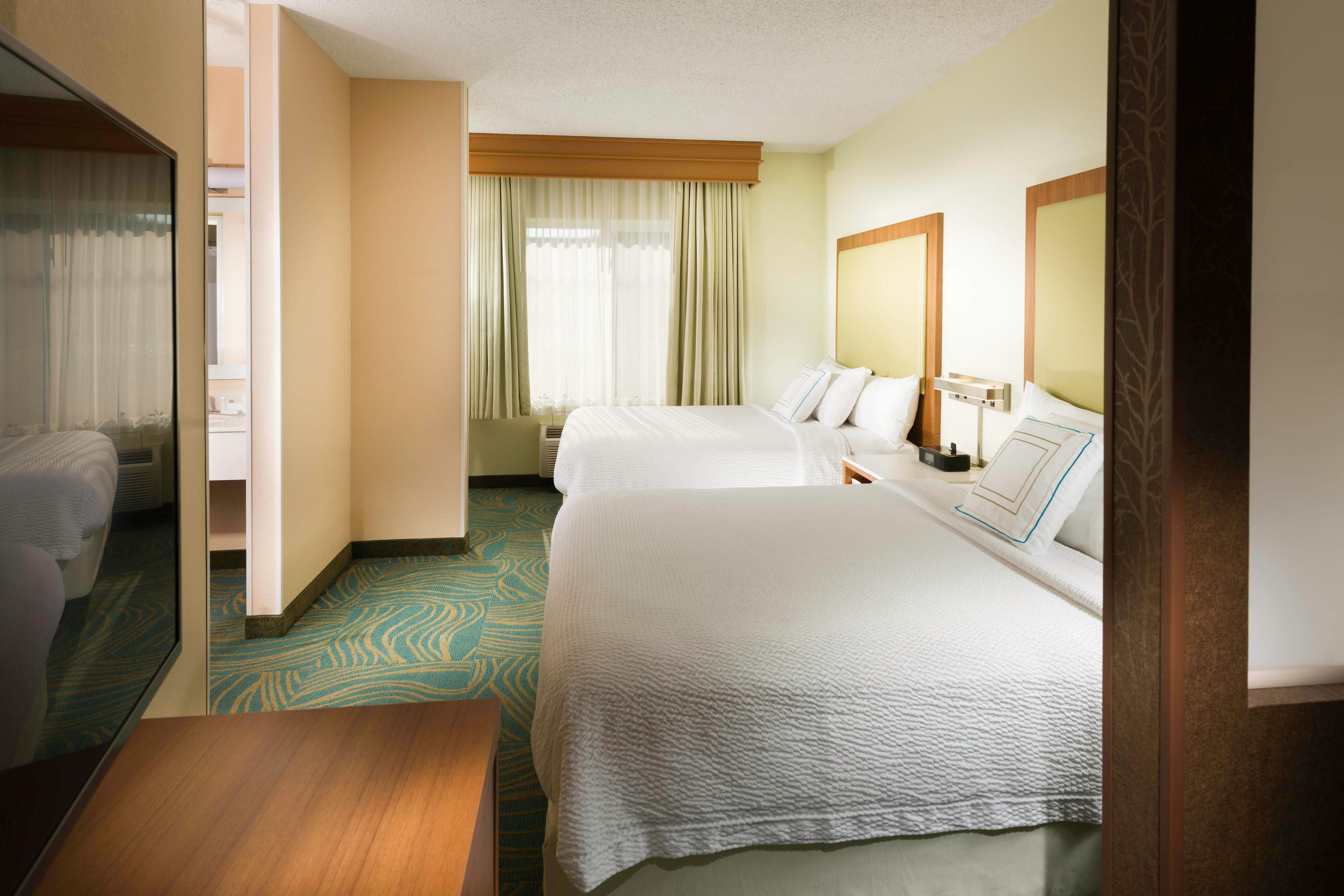 Our spacious Queen/Queen Suite is perfect for your family's comfort.