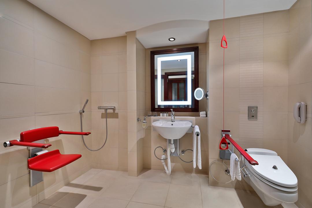 Call in advance to reserve one of our rooms with an accessible guest bathroom, featuring grab bars on the walls and a seat in the shower for all the safety you need.