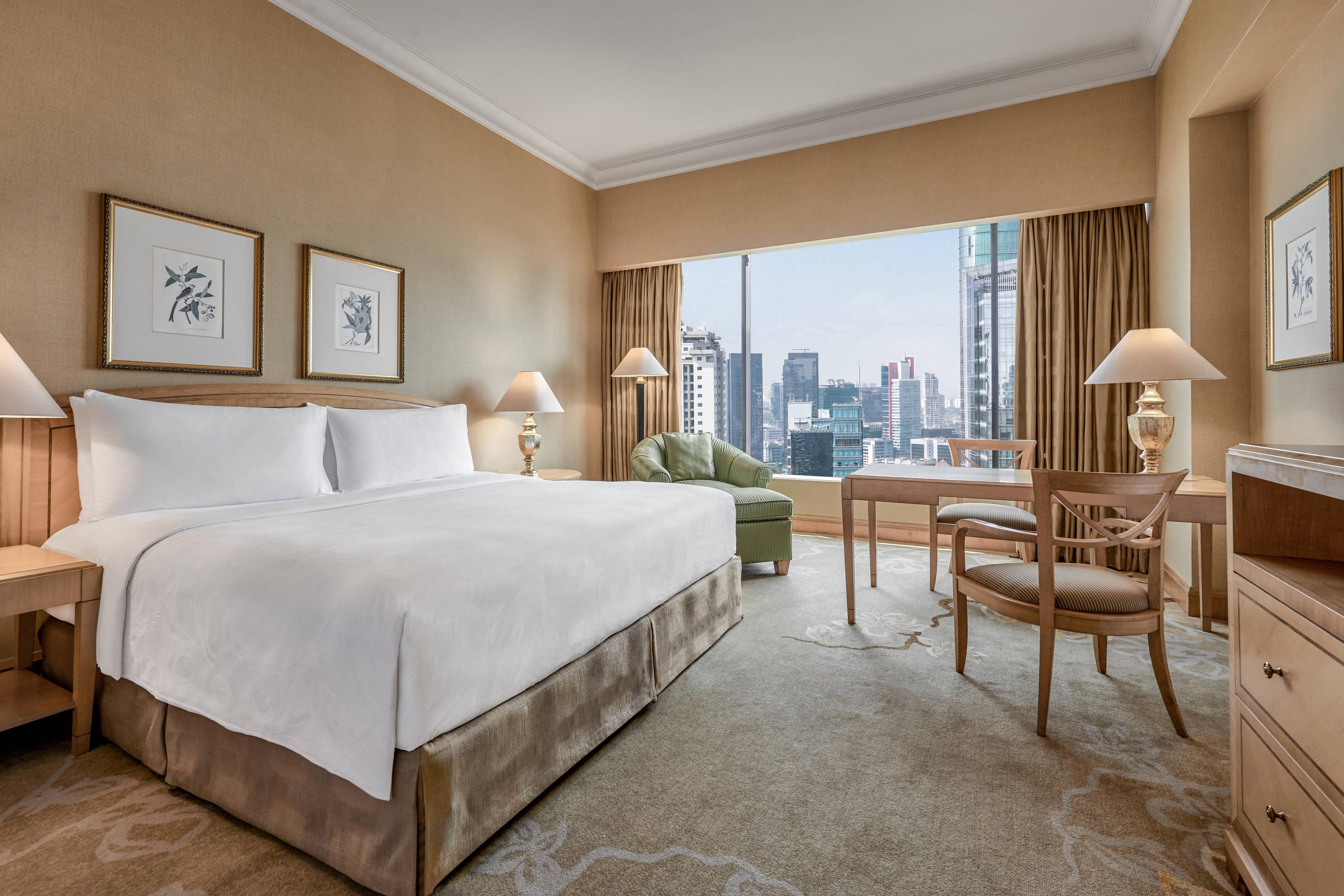 Our comfortable Deluxe Guest Rooms feature one king-size bed with a city view.