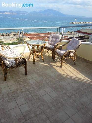 House with 2 bedrooms in Kiato with wonderful sea view and terrace 100 m from the beach in KIATON, Greece