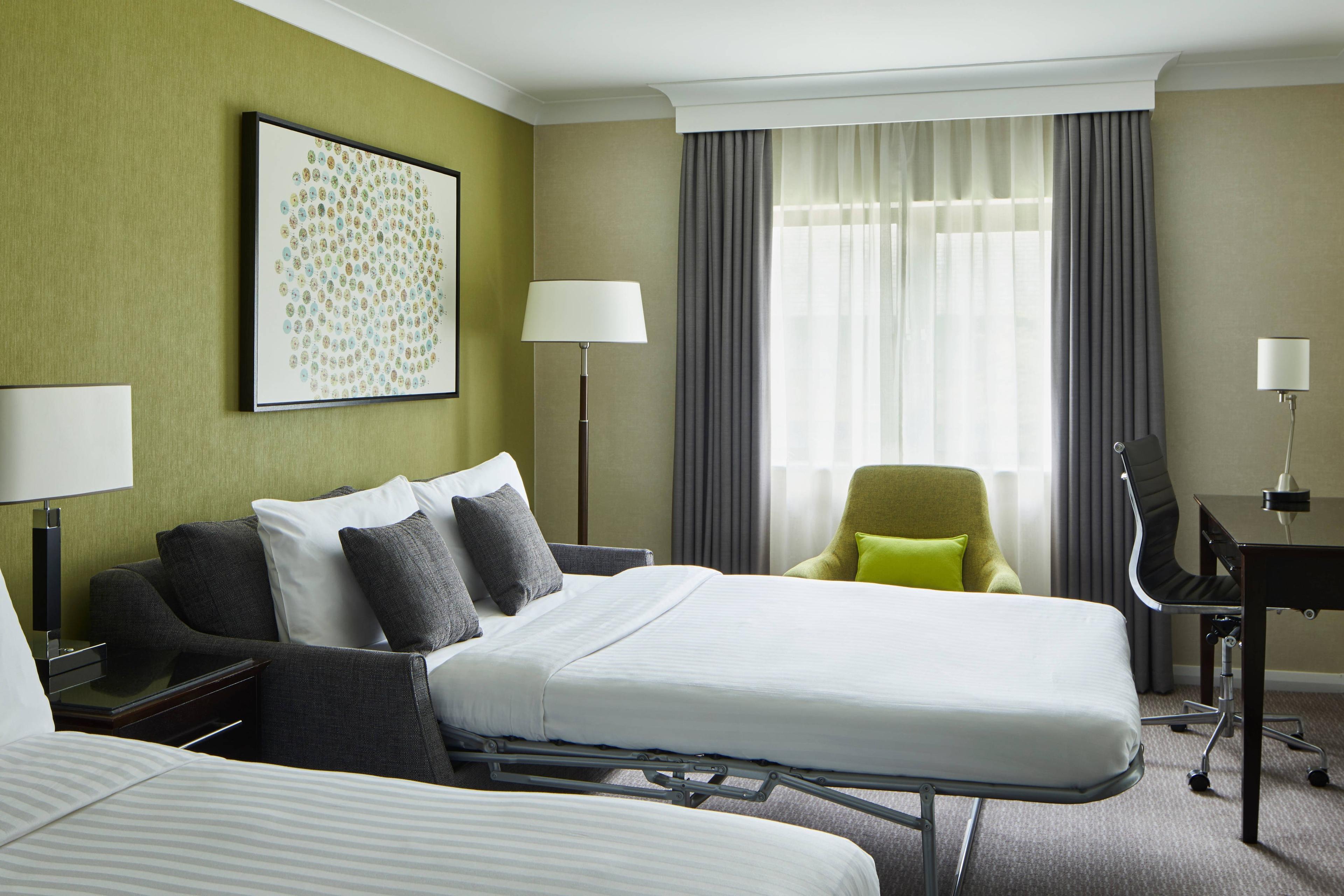 Our family guest rooms are great for families on vacation, providing ample space with a sofa bed that folds away.