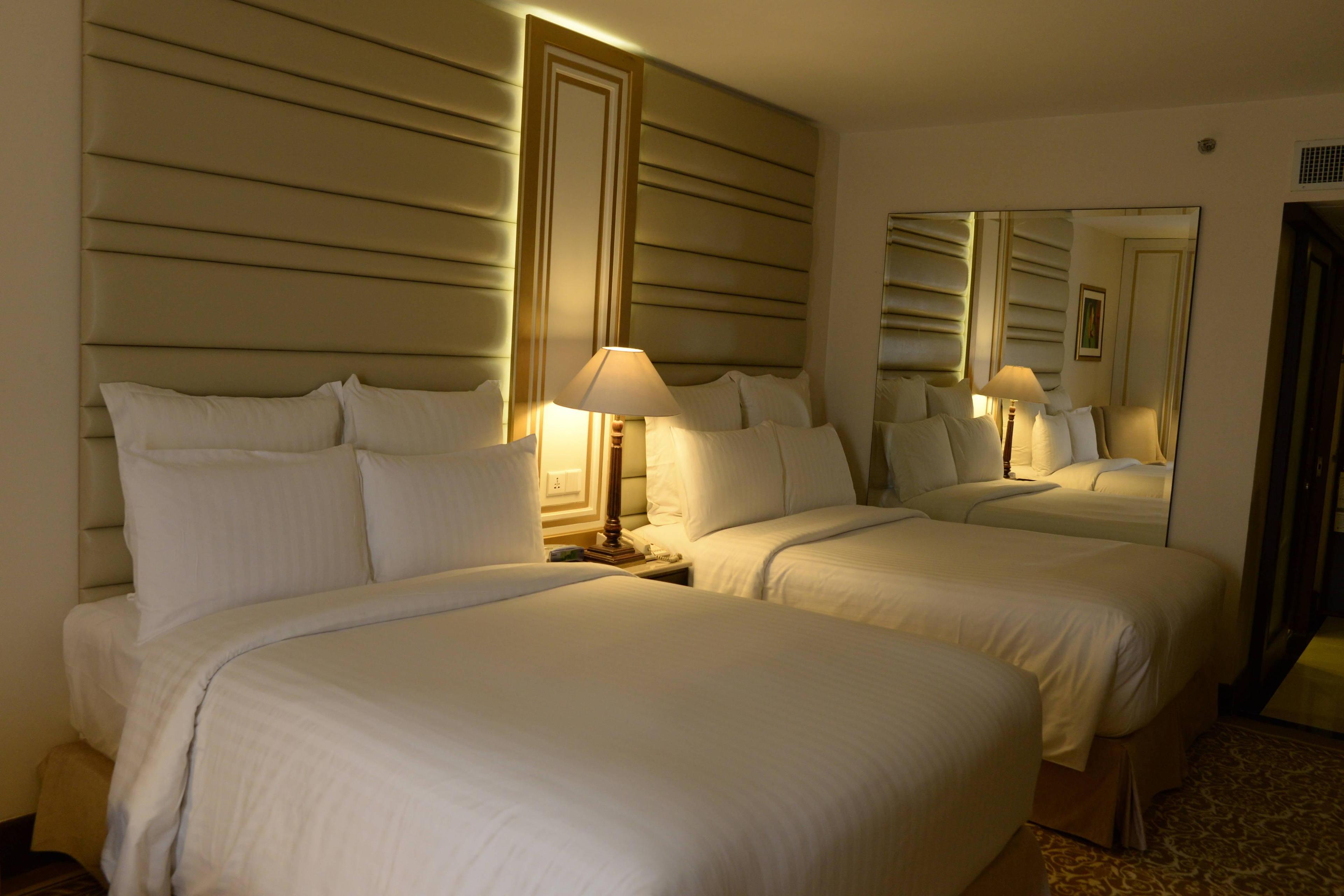 Our deluxe twin/twin guest room sleeping area has a long mirror along with the work desk that is well equipped with modern connectivity plugins, it is big enough to share in comfort.
