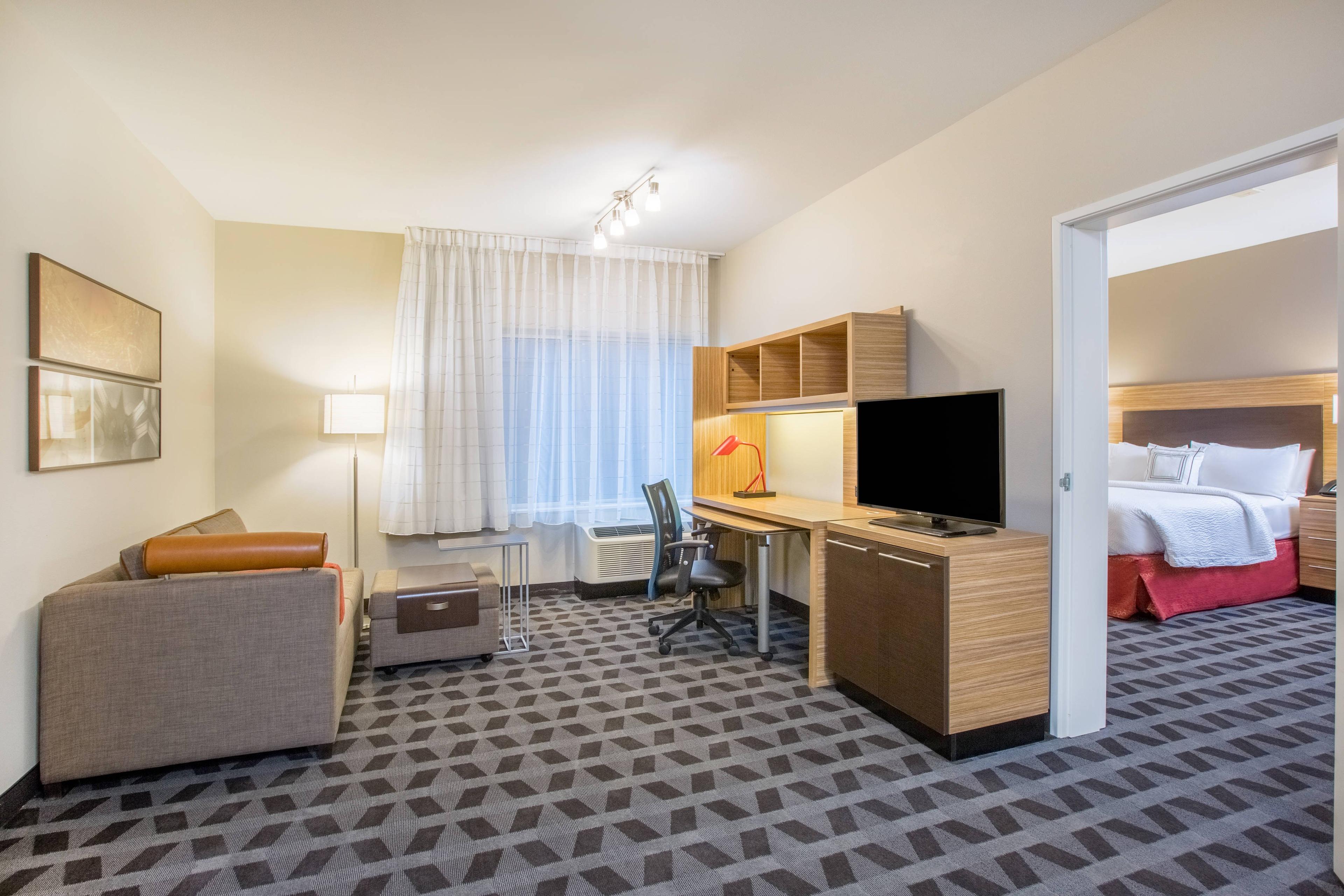 Spread out and relax in a newly refreshed One-Bedroom Queen Suite, offering separate living and sleeping areas so you can work or relax without any distractions. A full kitchen is also featured for when you’re ready to refuel.