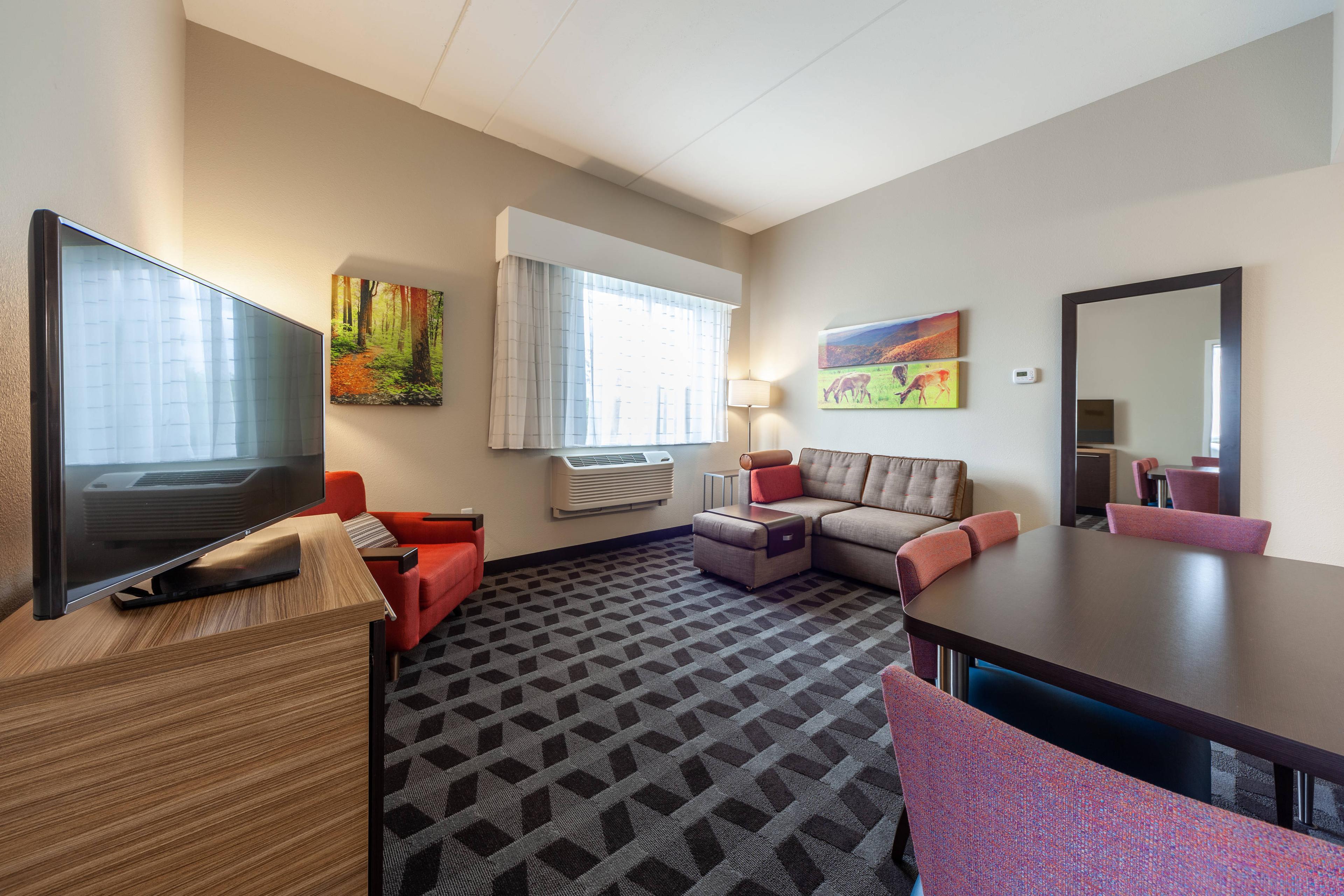 Enjoy the extra space to stretch out and relax in our private living room area.